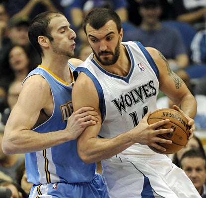 Center Nikola Pekovic helps fuel the Wolves past the Nuggets with his 22-point, 11-rebound effort. (AP)