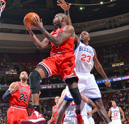 Luol Deng scores 19 points and grabs 12 rebounds and the short-handed Bulls pull out a big win in Philadelphia.  (Getty Images)