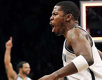 Brooklyn guard Joe Johnson celebrates after hitting a buzzer-beating shot to knock off Detroit. (AP)