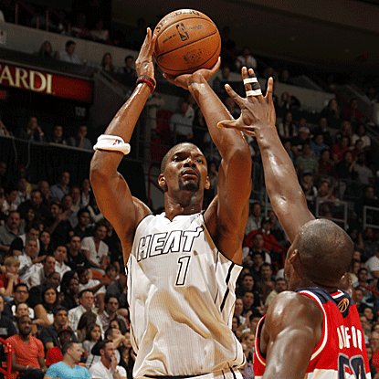 Chris Bosh chips in with 12 points as the Heat build a 33-point lead by the third quarter.  (Getty Images)