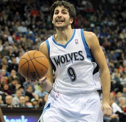 Ricky Rubio, in his first game in nine months, dishes out nine assists and scores eight points in Minnesota's win.  (US Presswire)