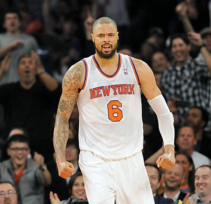 Tyson Chandler finishes with 23 points -- 21 in the second half -- and 10 rebounds to help the Knicks remain unbeaten at home. (AP)