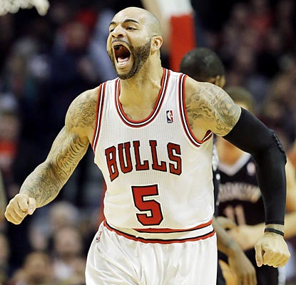 Carlos Boozer (15 points) and the shorthanded Bulls get the job done against the Nets. (AP)