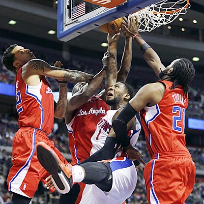 Pistons forward Andre Drummond (1) battles three Clippers, including Ronny Turiaf (right), for a rebound in the fourth quarter. (AP)