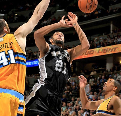The Nuggets get past the Spurs despite Tim Duncan racking up 31 points, 18 rebounds, six assists and five blocks. (Getty Images)