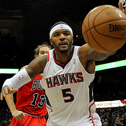 All five starters for the Hawks score in double figures, including Josh Smith, who adds 12 points in the win. (AP)