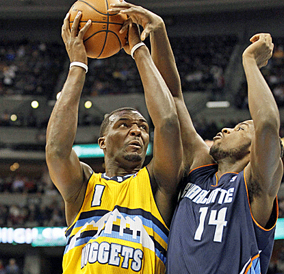 Jordan Hamilton drives on Michael Kidd-Gilchrist as the Nuggets send the Bobcats to their 15th straight loss.  (US Presswire)