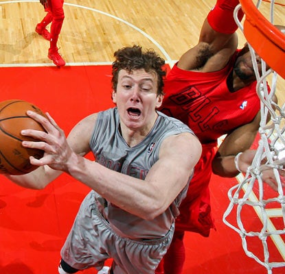First-year Rocket Omer Asik returns to Chicago and hurts his former team with a 20-point, 18-rebound line. (Getty Images)