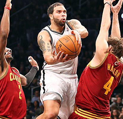 Deron Williams scores 15 points to complement Brook Lopez's 35 as the Nets win their second straight.  (US Presswire)