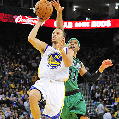 Stephen Curry puts together an all-around game, scoring 22 points to go with nine assists in a Warriors win.  (US Presswire)