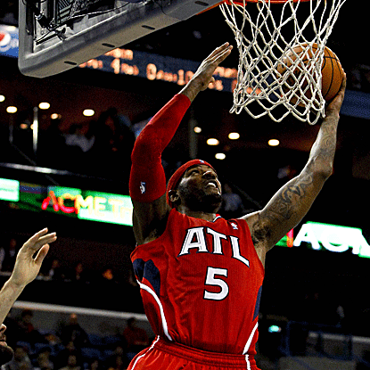 The Hawks frontcourt of Josh Smith (pictured), Al Horford and Zaza Pachulia combine for 55 points and 26 rebounds. (US Presswire)