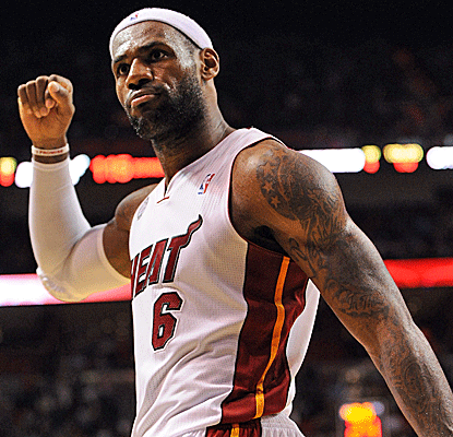 LeBron James misses a potential game-winner in regulation, but finishes just one assist shy of a triple-double.  (US Presswire)