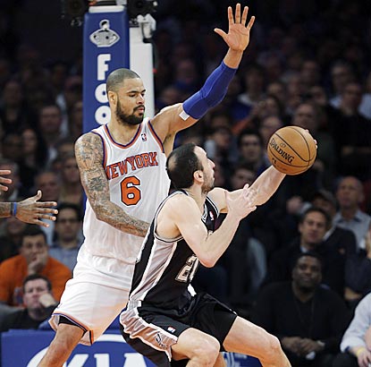 Tyson Chandler and the Knicks stand tall against Manu Ginobili and the Spurs' league-best offense.  (AP)