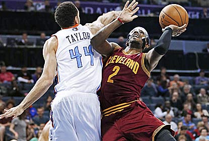 Kyrie Irving scores 14 of the Cavs' final 16 points, including the game-winning pull-up jumper with a second left. (AP)