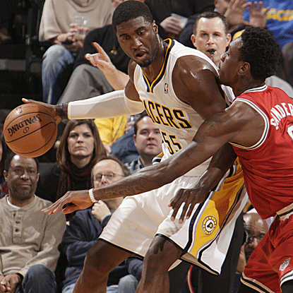 Roy Hibbert pulls down a career-high 11 offensive rebounds (15 overall) to help the Pacers defeat the Bucks. (Getty Images)