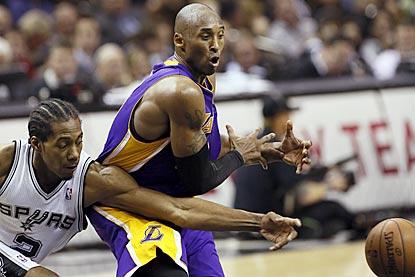 Spurs forward Kawhi Leonard steals the ball from Kobe Bryant during the second half.  (US Presswire)