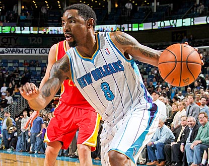 Roger Mason, who plays four minutes in the first three quarters, goes 5 for 5 in the fourth with five rebounds.  (Getty Images)