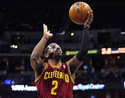 Cavaliers guard Kyrie Irving, battling an illness, scores a game-high 28 points, but Cleveland blows a fourth-quarter lead. (US Presswire)