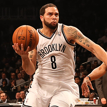 Deron Williams scores 22 points and adds nine assists as the Nets improve to 8-1 under interim coach P.J. Carlesimo. (US Presswire)