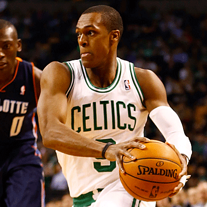 The Celtics' Rajon Rondo scores 17 points with 12 assists and 10 rebounds to earn his third triple-double of the season. (Getty Images)
