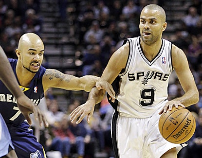 Tony Parker, who scores 17 points and dishes out 11 assists, works the ball around Memphis' Jerryd Bayless. (AP)