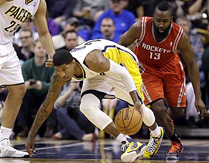 Indiana's Paul George grabs a steal from Houston's James Harden on his way to 31 points. (AP)