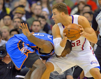 Serge Ibaka (left) is locked up by Blake Griffin during the Thunder's win. Griffin finishes with a team-best 31 points. (AP)