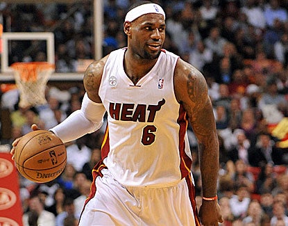 LeBron James finishes with 31 points, 11 assists and 10 rebounds for Miami against the Raptors. (US Presswire)