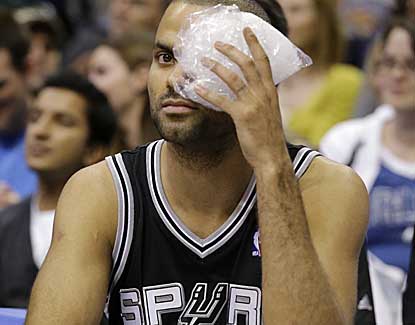 Tony Parker returns from a cut near his eye to finish with 23 points in the Spurs' win over Dallas. (AP)