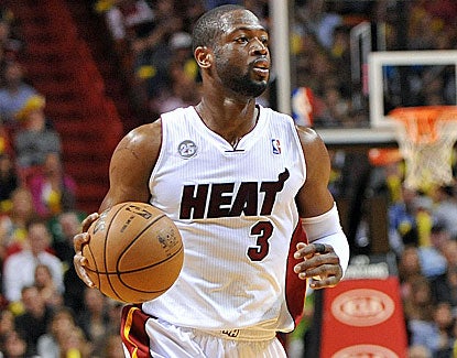 Dwyane Wade scores 29 points, sparking a pivotal run to help the Heat earn their fourth victory in a row. (US Presswire)