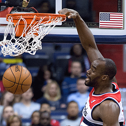 Emeka Okafor powers his way to 15 points and 16 rebounds to lead the Wizards to their fifth straight home victory. (Getty Images)