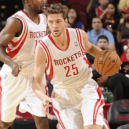 Chandler Parsons tallies a career-high 11 assists to help lead the Rockets past the Nets for the 12th straight time. (Getty Images)