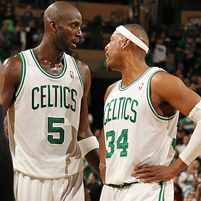 Paul Pierce (right) hits the go-ahead bucket with 31 seconds left in double OT to put the Celtics over the Heat. (Getty Images)