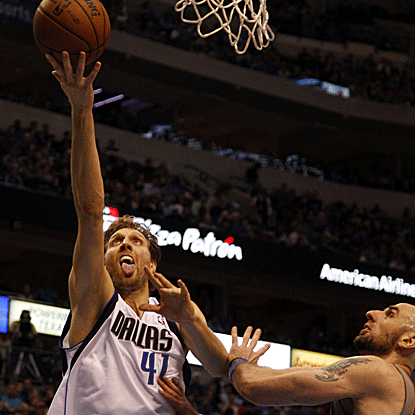 The Mavs' Dirk Nowitzki scores 18 points and passes Allen Iverson for 18th on the NBA's career scoring list. (Getty Images)