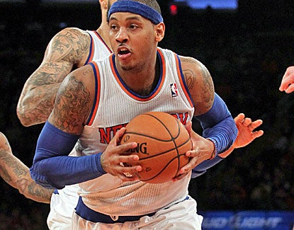 Forward Carmelo Anthony scores 25 points to go with 6 assists in the Knicks win, but he also suffers 7 turnovers. (Getty Images)