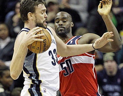 Memphis center Marc Gasol scores 13 points, grabs 15 rebounds and dishes out 5 assists against the Wizards. (AP)