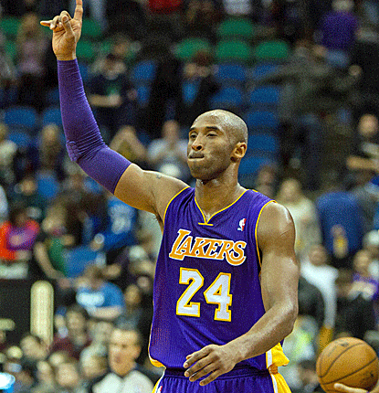 Kobe Bryant continues with his giving ways, falling just two assists shy of a triple-double against the Wolves.  (US Presswire)