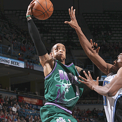 Monta Ellis goes for 21 points and adds 11 assists to lead the Bucks past the struggling Magic. (Getty Images)