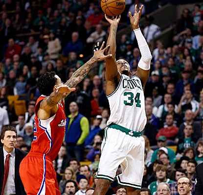 An off-balance Paul Pierce lets fly with less than 3 seconds left and sinks the trey to help put away the Clippers in Boston. (US Presswire)