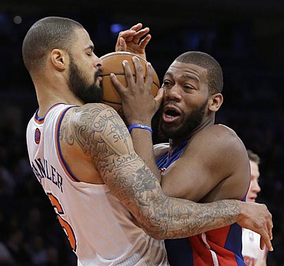 Getting past Tyson Chandler, the reigning NBA Defensive Player of the Year, can be a tough task. Just ask Greg Monroe.  (AP)