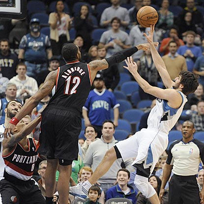 Portland's LaMarcus Aldridge blocks Ricky Rubio's potential game-tying shot in the final seconds.  (AP)