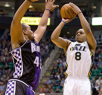 Randy Foye, who leads Utah with 20 points, attempts a 3-point shot over Sacramento's Chuck Hayes during the second half.  (US Presswire)