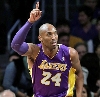 Kobe (21 points) and the Lakers close out the game strong to finish on top once again against the Nets. (AP)