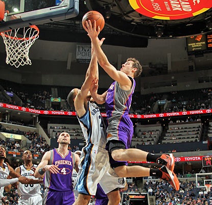 After being silent for three quarters, the Suns' Goran Dragic scores 15 of his 17 points in the final period. (Getty Images)