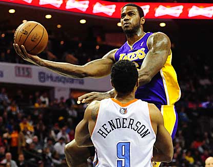 Earl Clark goes up for two of his 17 points, while also grabbing 10 boards in LA's comeback win. (US Presswire)
