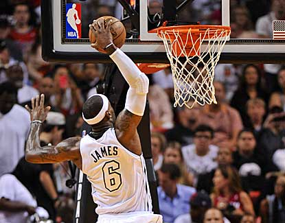 LeBron James elevates for the jam on his way to 32 points in Miami's win over the Lakers. (US Presswire)