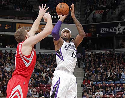 Sacramento's DeMarcus Cousins puts up a jumper en route to 20 points in the Kings' win over Houston. (Getty Images)
