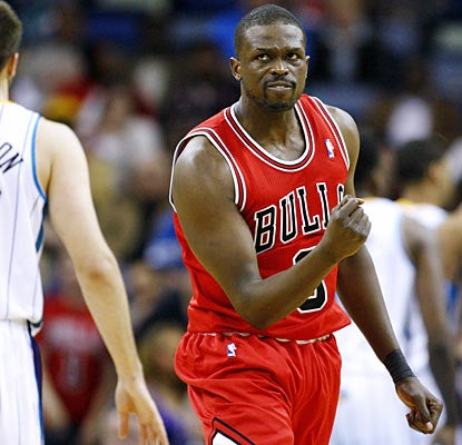 Bulls forward Luol Deng (20 points) helps put away the Hornets with a jumper with 44.8 seconds left in the game. (AP)