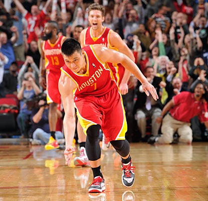 Jeremy Lin (front) and James Harden (back left) combine for 75 points, 14 rebounds and 14 assists against the Thunder. (Getty Images)