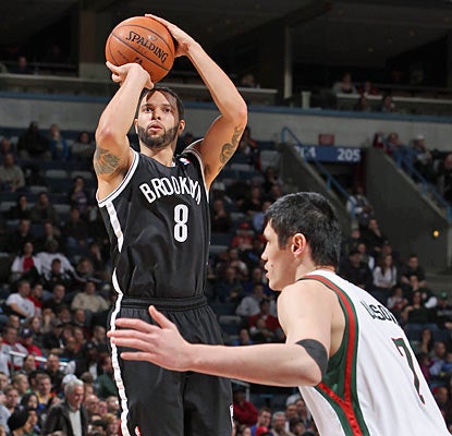 The Nets get 23 points and eight assists from Deron Williams, who finishes 7 of 16 from the field. (Getty Images)